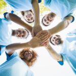 group-of-volunteer-forming-huddles.jpg
